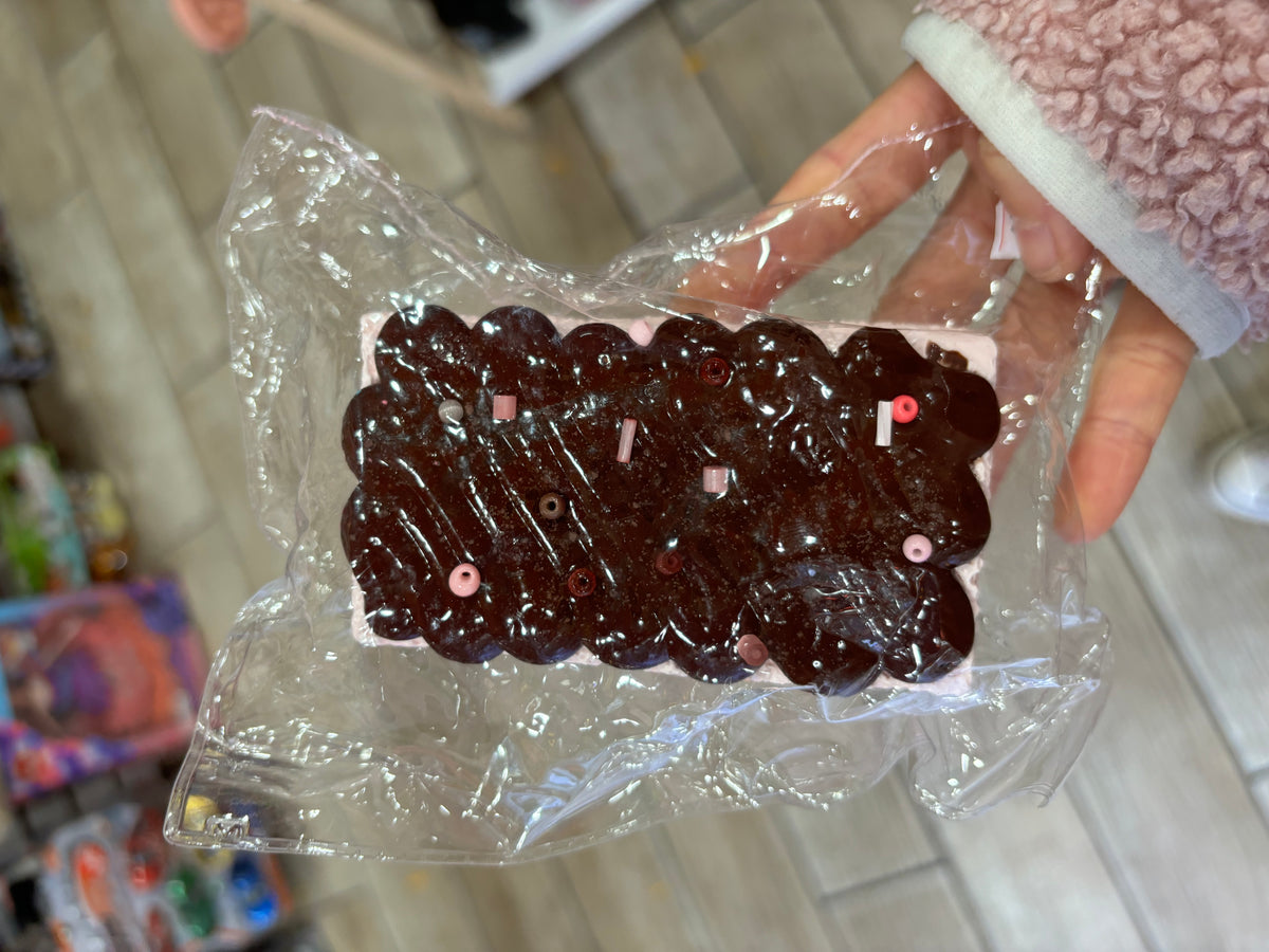 Brown Wavy Hair Clip with Pink Decorative Accents