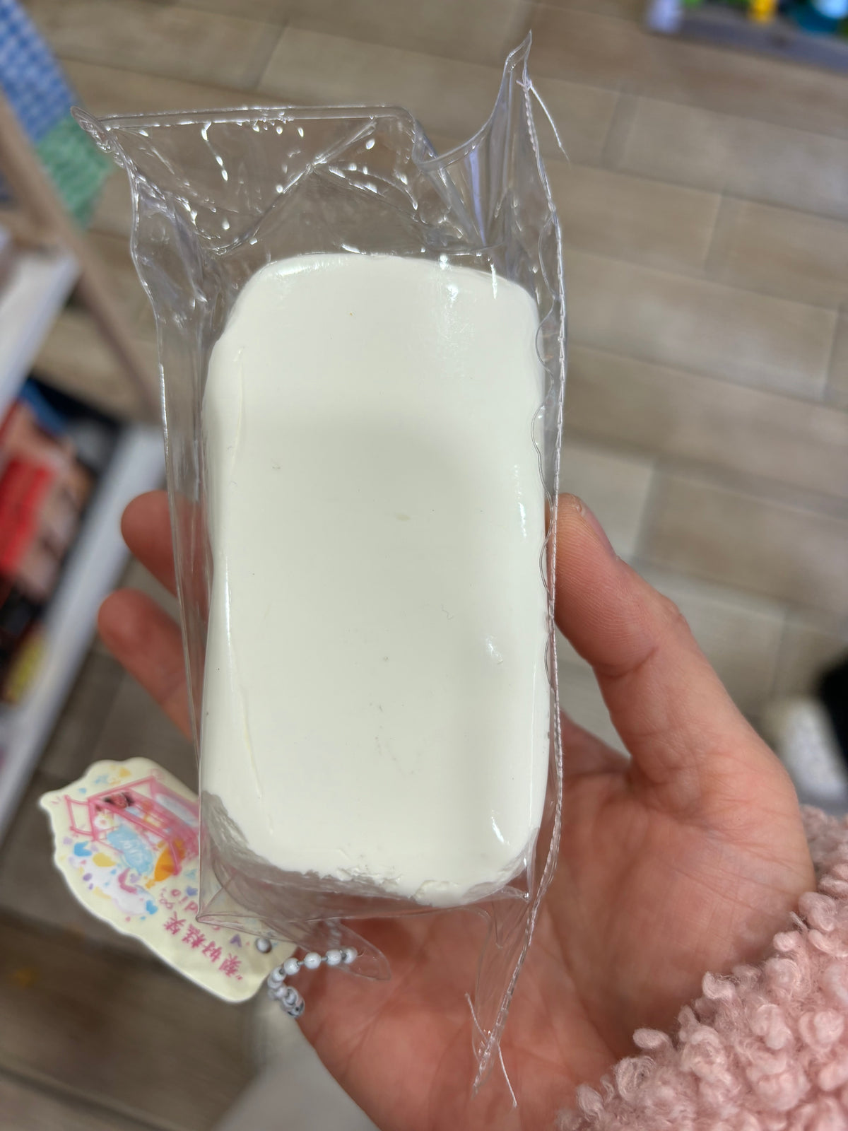 White Cream Toast Squishy Toy – Cute Pastel Design